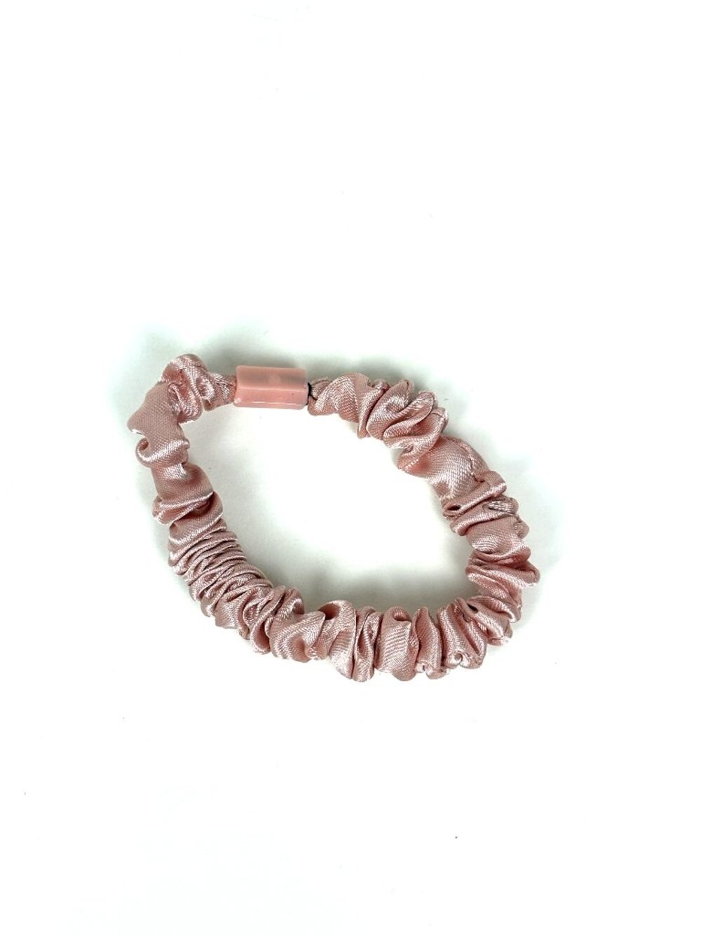 Skinny satin hair scrunchie / skinny hair tie in a light pink / blush shade. New